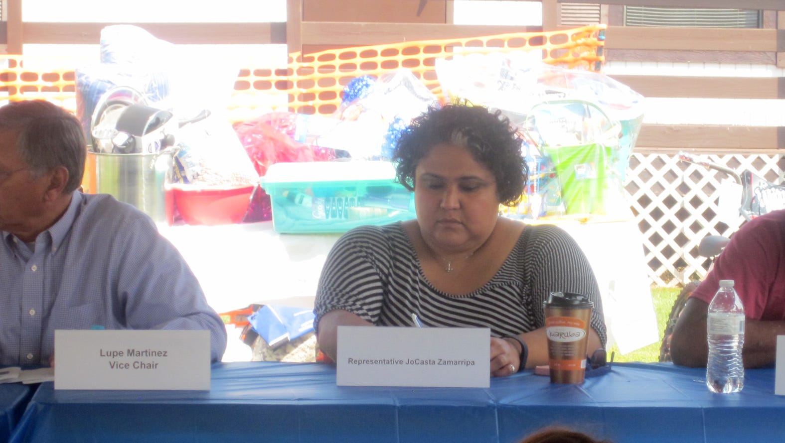 Members of the Governor's Council on Migrant Labor listen to testimony on the need for additional safe, affordable housing for seasonal agricultural workers.  Pictured (from left) are Lupe Martinez, interim Chair of the Governor's Council on Migrant Labor, President/CEO, UMOS, State Representative JoCasta Zamarripa, and Dr. Enrique Figueroa.