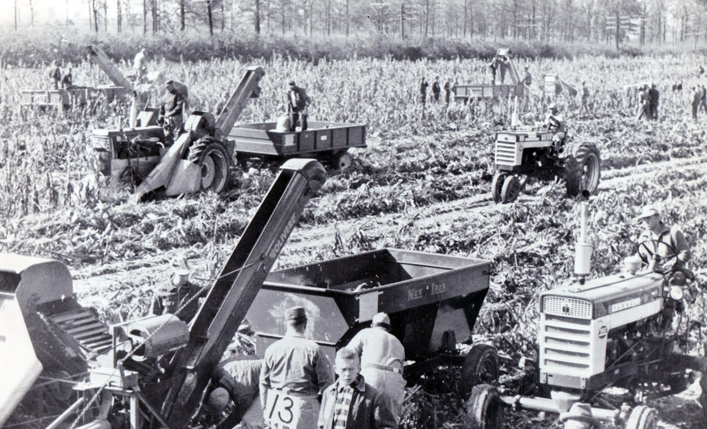 Mechanical corn picking contests were sponsored by corn breeders who worked to create hybrids that would work better for mechanical pickers. Pictured is a 1959 Indiana contest.