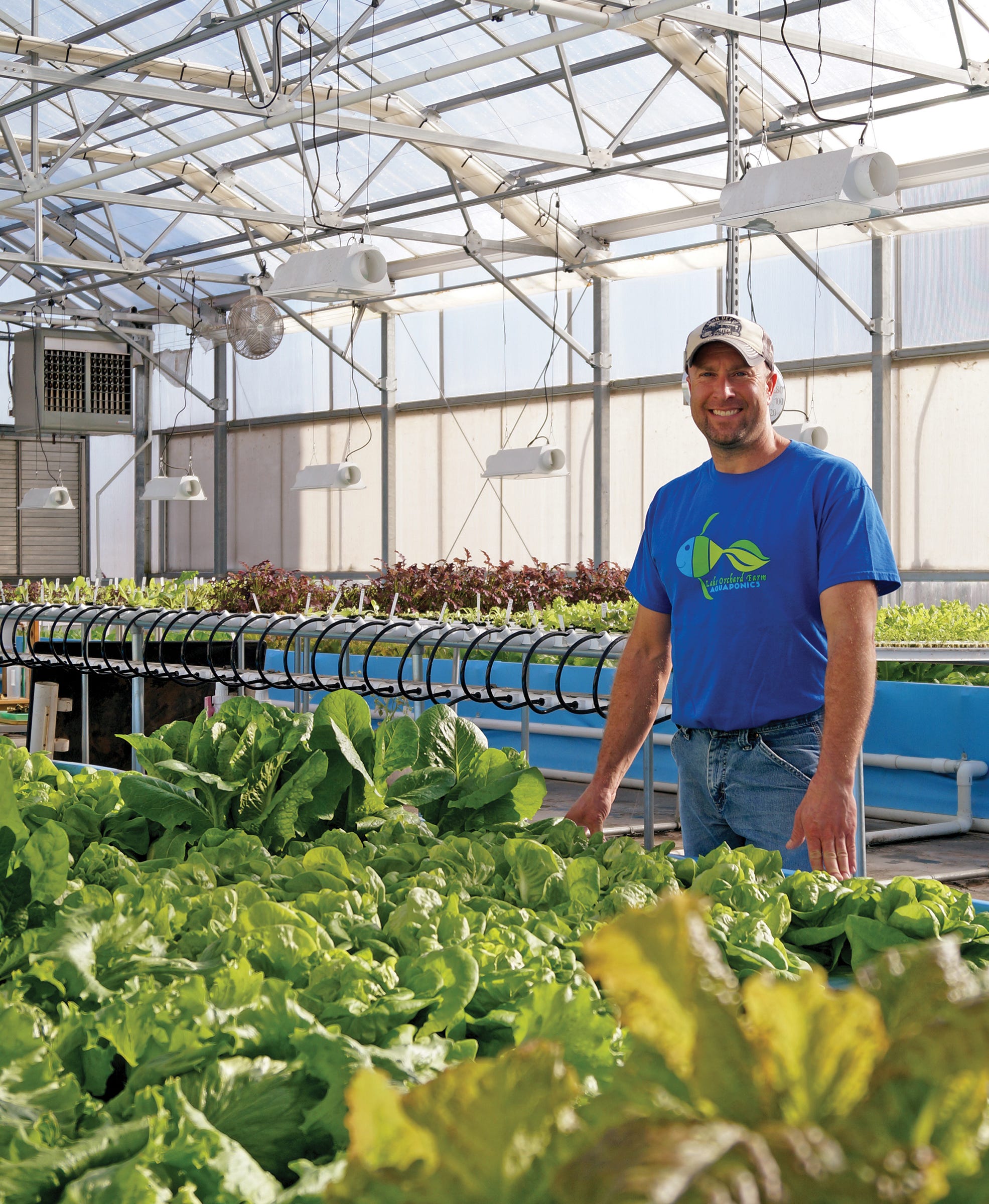 Sixth generation farmer, Nate Calkins, used to work with cattle but now he spends his days handling a new ‘stock’ as co-owner of Lake Orchard Farm Aquaponics.
