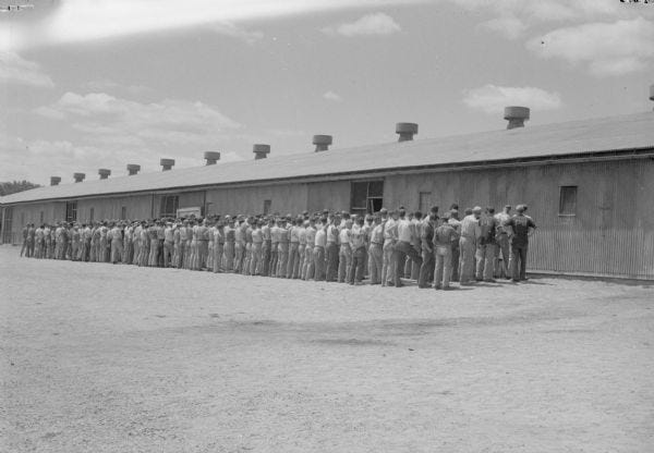 German POWs in Columbus line up outside of their barracks.