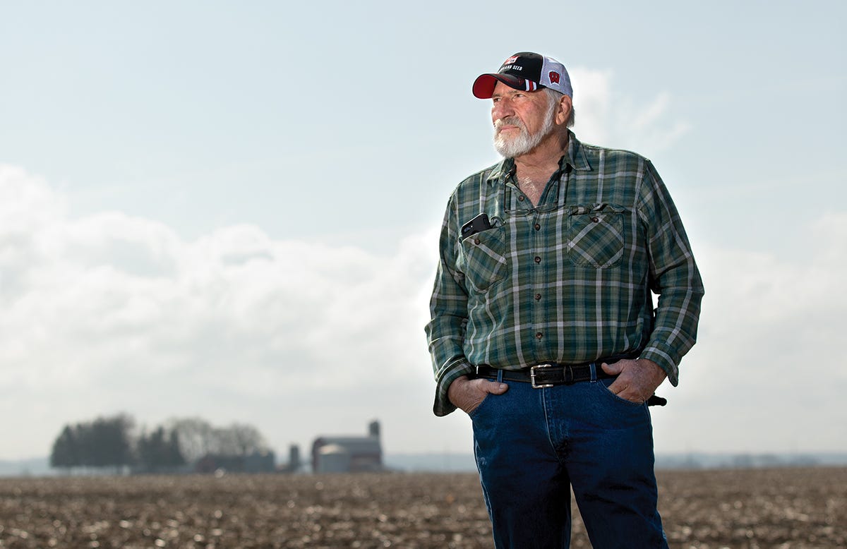 Mike Cerny is shown in a recently planted soybean field on his farm near Sharon, Wis., in early May 2019.