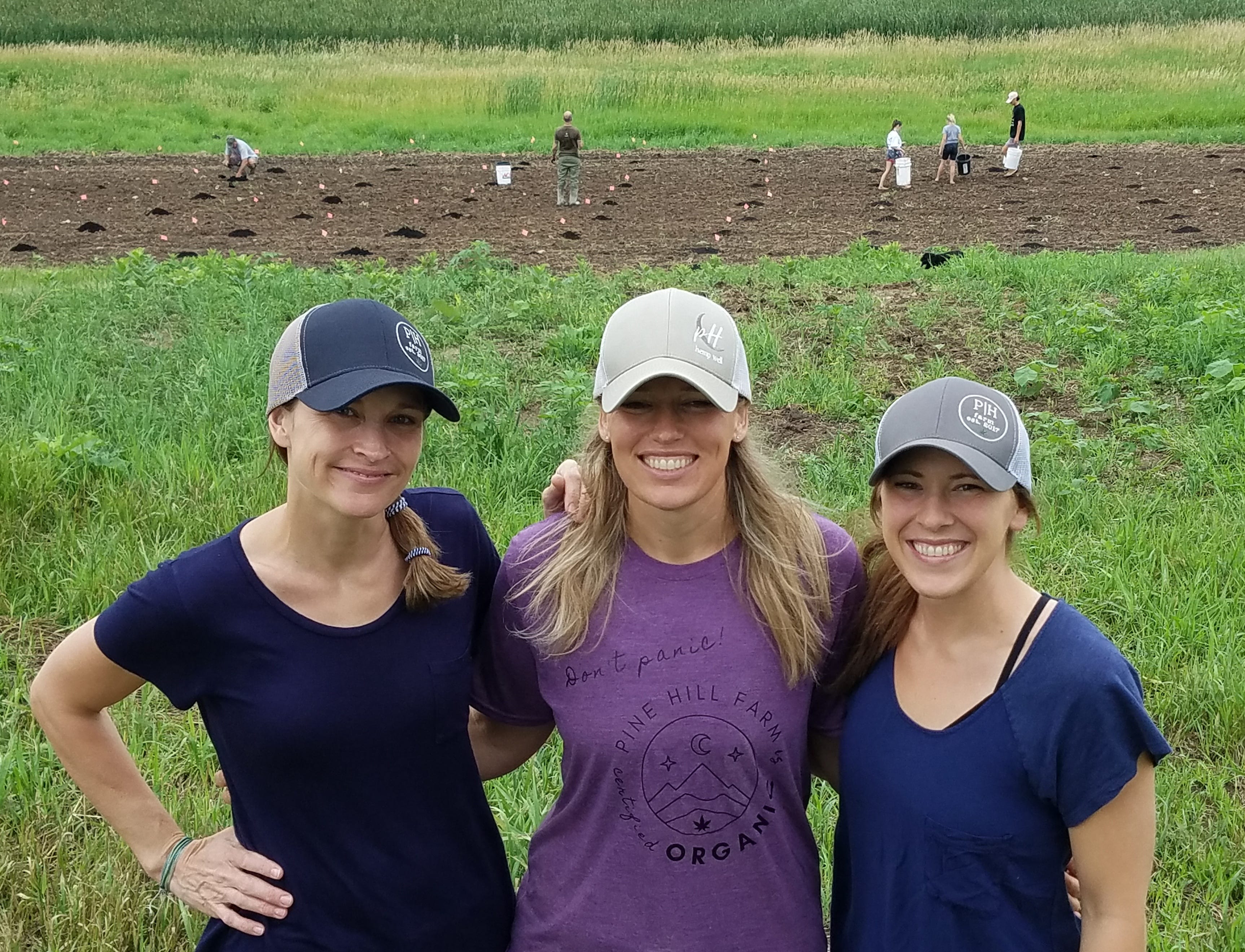 Sisters, from left, Jackie, Leanne and Lynley raise and market hemp at the Watertown area farm where they grew up.  Behind them their children assist with the planting process.  They also help weed the fields and pick the stones.